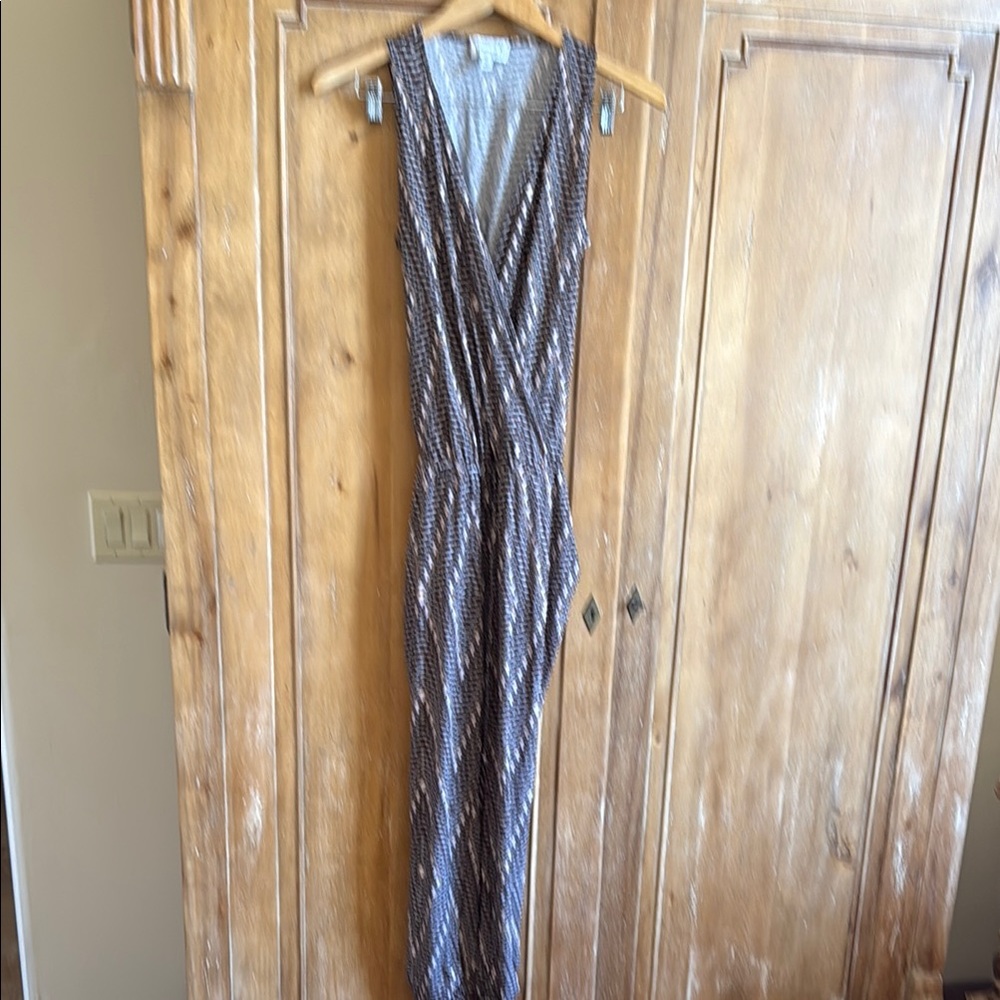 Elegant Sleeveless Wrap jumpsuit with tapered legs